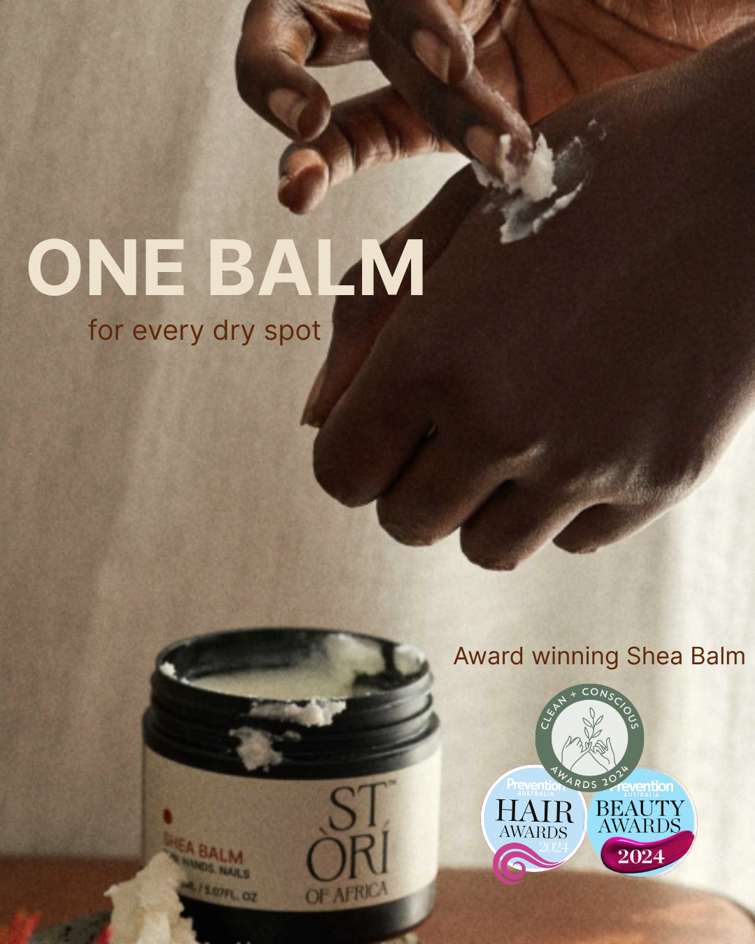 Stori Shea Balm being applied to a hand with product packaging and awards displayed.